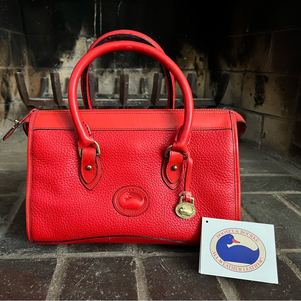 Vintage Dooney Bourke zip-top satchel in red with matching red trim original tag